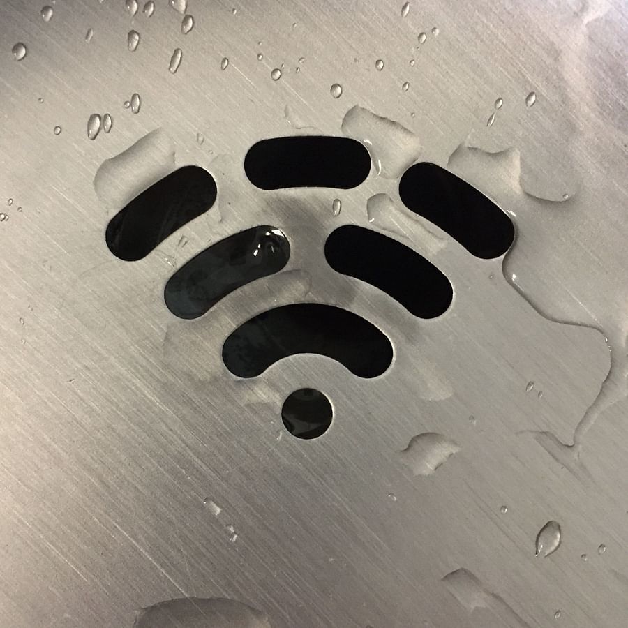 wi-fi symbol against an opaque glass - V Five Hotel