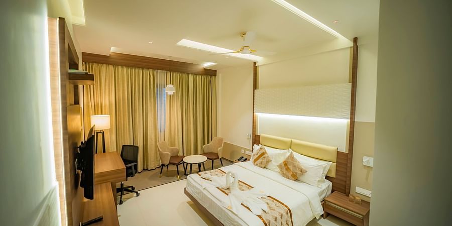 A full view of double Bed in the Executive Room With Breakfast at Kyriad Prestige, Ilkal