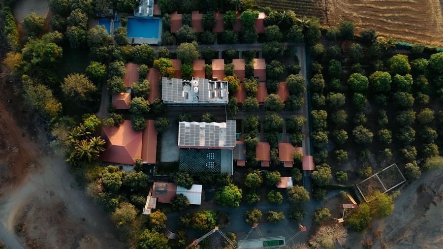 An overhead shot of Daksh Resort & Amusement Park, Sasan Gir, surrounded by greenery.