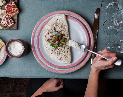 A plate with a dish.