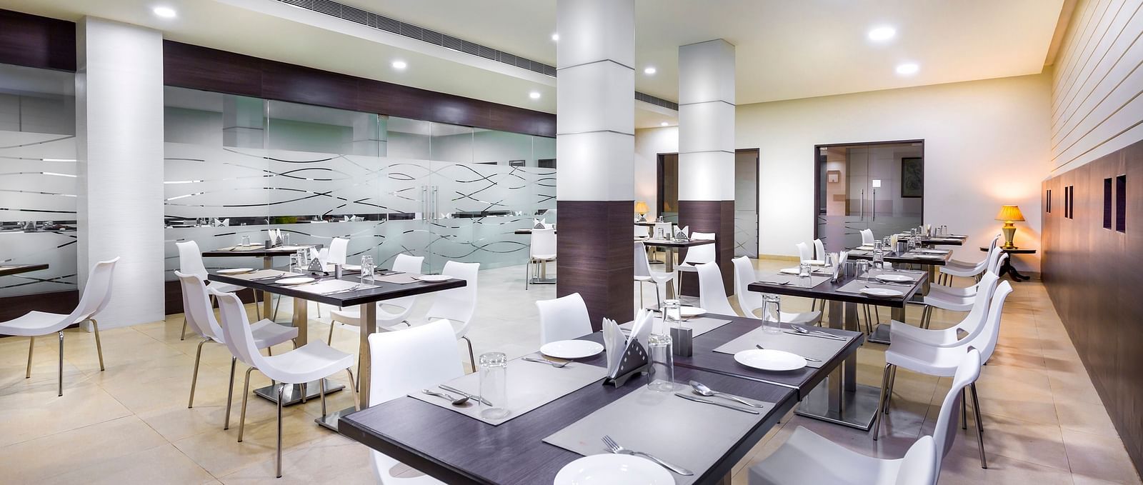An image of a dining of Amudham Restaurant at Regency Tiruttani by GRT Hotels.