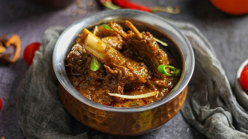 A close-up shot of an Indian meal served in a bowl.