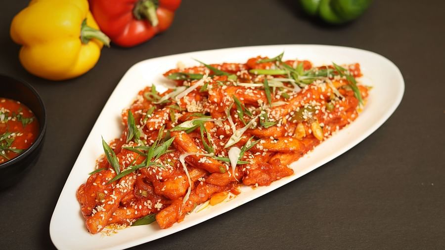 An image of french garnished with spring onions and coriander leaves in a platter at the restaurant of Five Elements Hotels North Avenue, Delhi