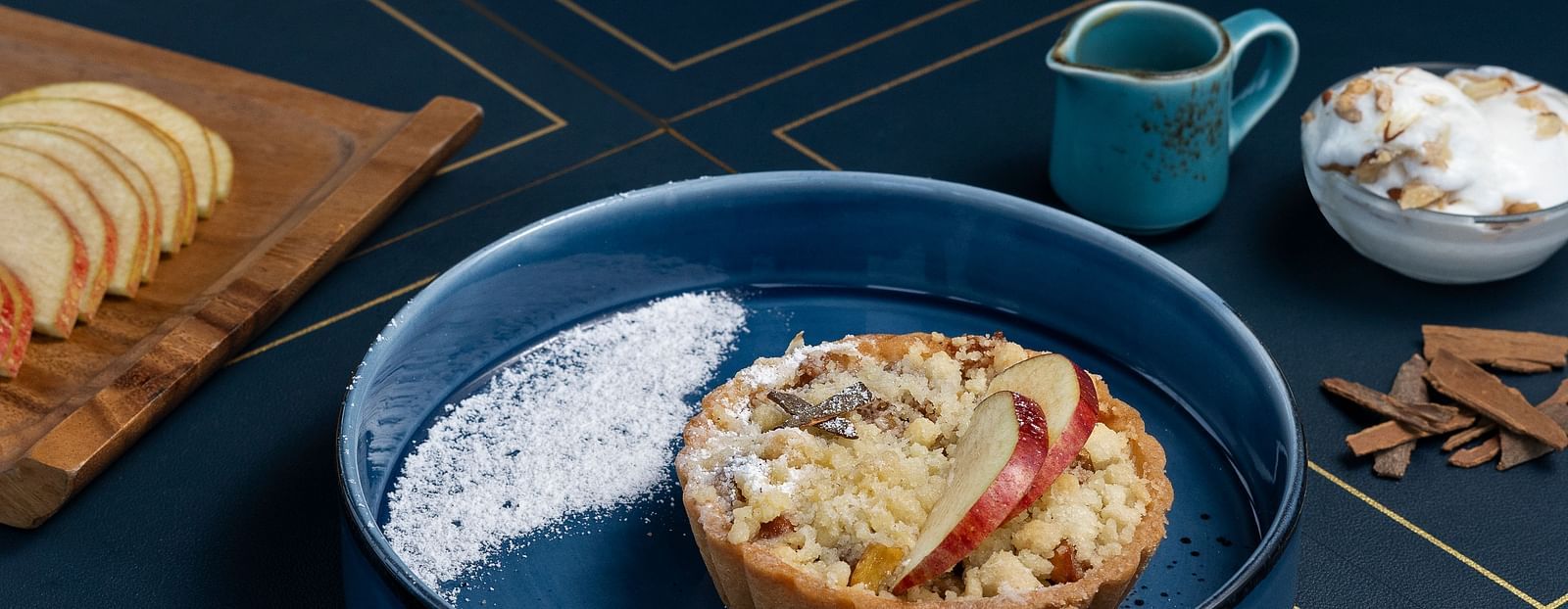 A mouthwatering sweet dish, served in a blue bowl.