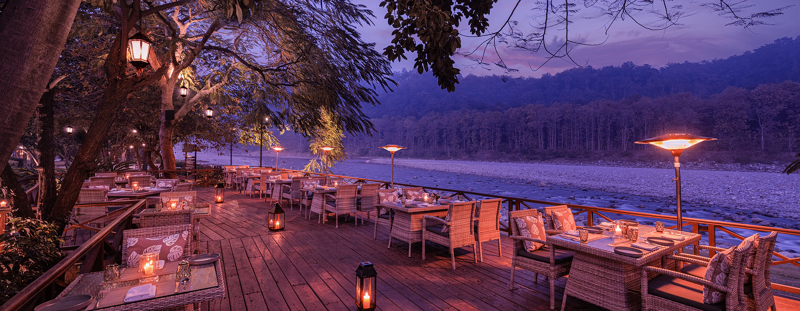 An image of an outdoor dining area beside a lake - The Riverview Retreat,  Corbett
