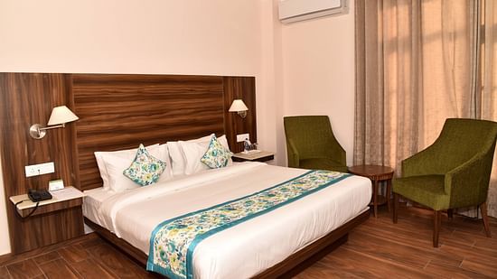 In the Super Deluxe Room with Balcony at Mastiff Hotel, Gopalpur, you'll find a cozy, comfortable, and king-size bed.