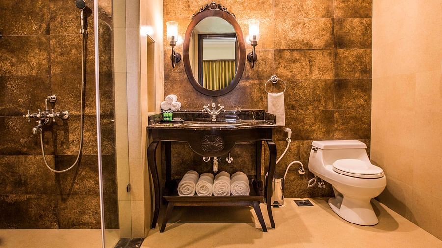 an image of a bathroom with a mirror - Rhythm Lonavala