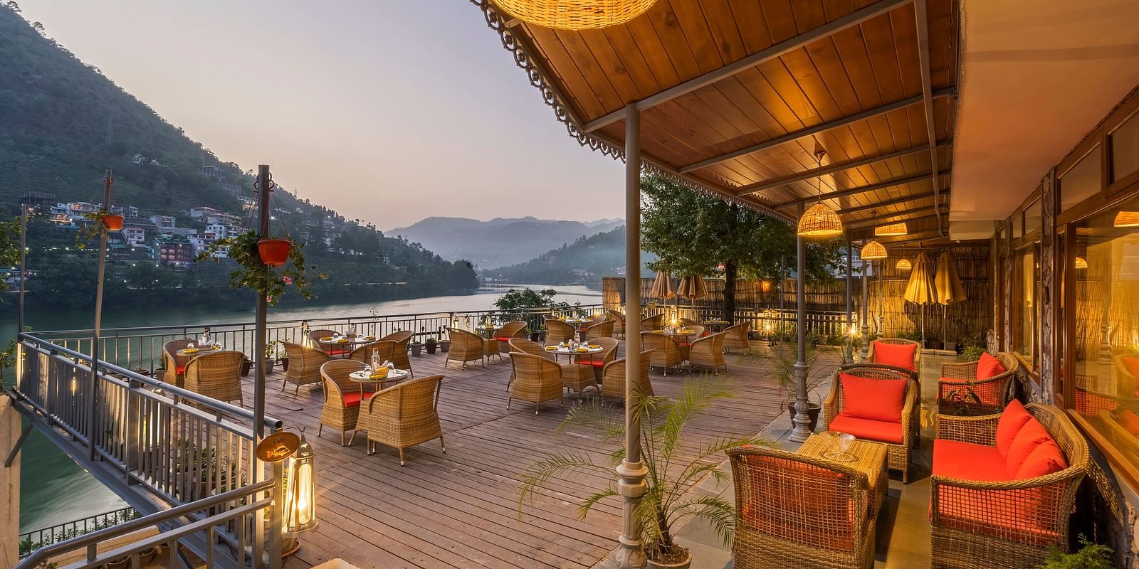 L-Attitude Deck at Fishermen's Lodge, Bhimtal, featuring a stunning view of the lake, perfect for relaxation and enjoyment.