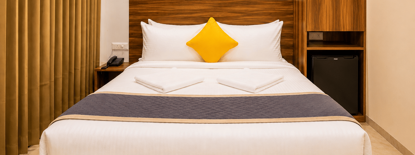 Comfortable room at Urban Comforts featuring modern interiors, warm lighting, and thoughtfully designed furnishings