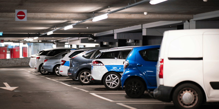 Covered parking facility with multiple vehicles parked in an organised indoor space at Bhavanis Vista By Icon Hosur.