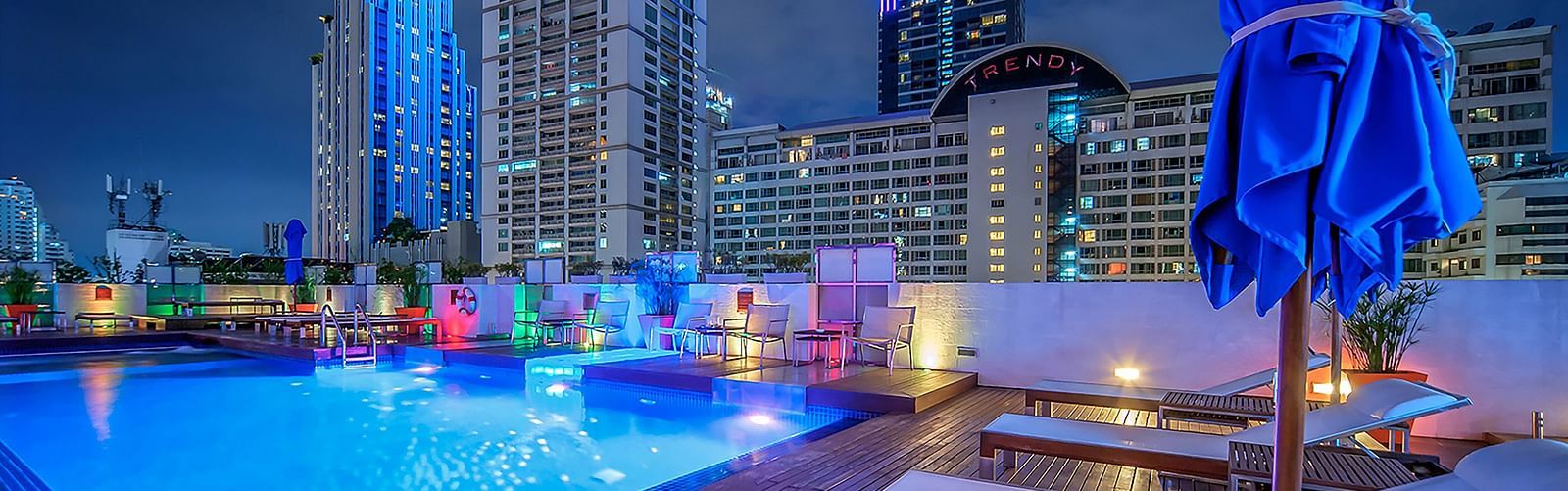 Rooftop swimming pool area at night - Night Hotel Bangkok