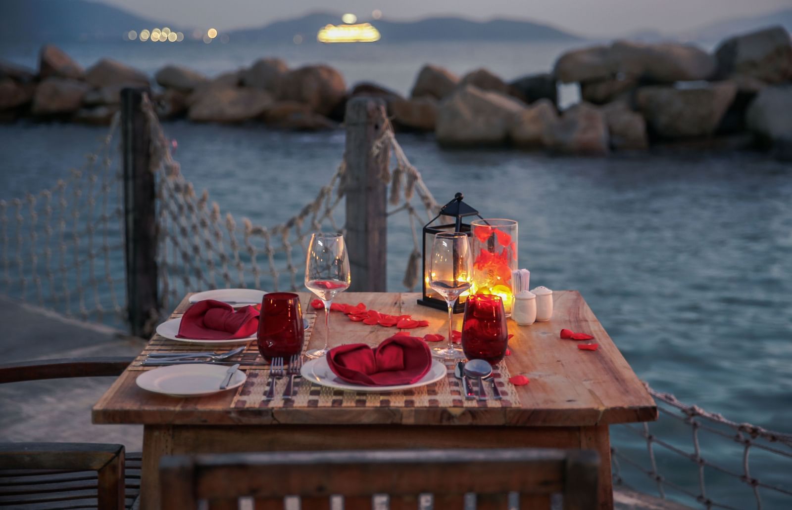 A candle light dinner setup by the Nha Trang bay - Alibu Resort Nha Trang