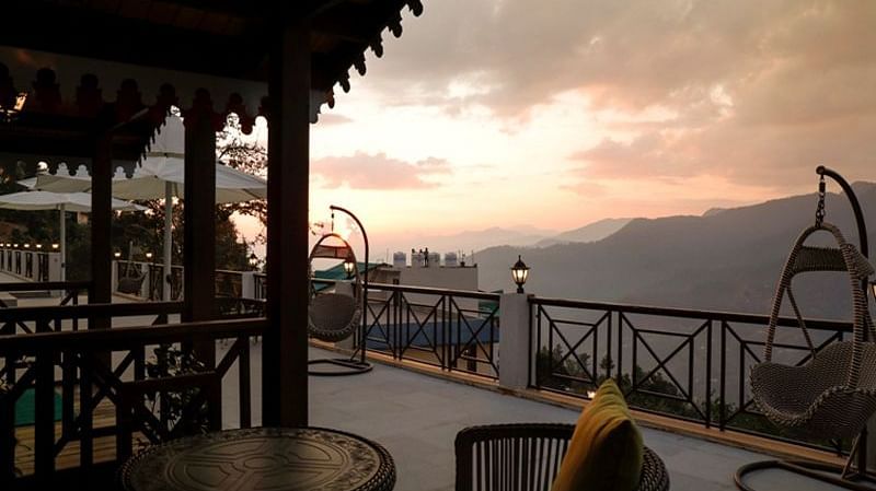 balcony overlooking the mountains with sunset