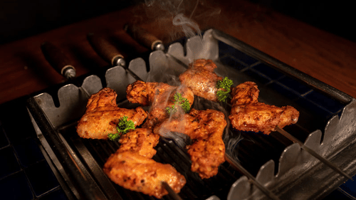 meat being grilled  on the barbecue 2