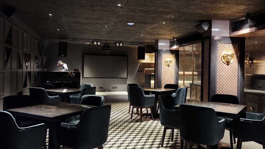 Seating arrangements inside Sizller - The Cindrella Hotel, Siliguri 3