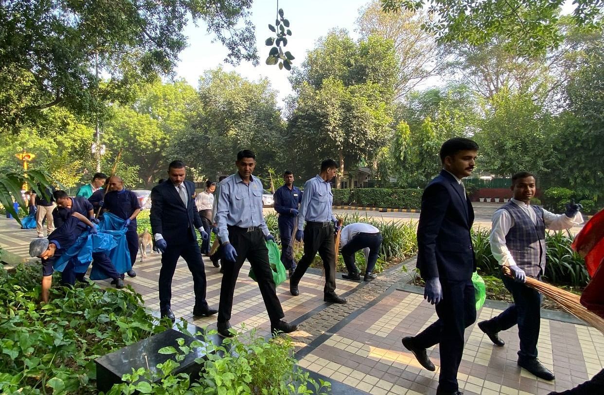 An image of people walking during our cleanliness drive - Claridges Collection