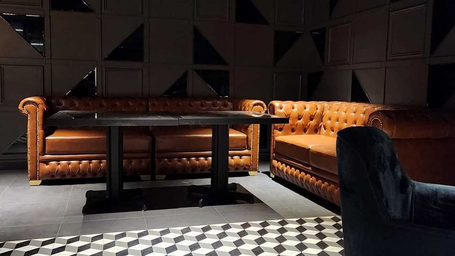 Seating arrangements inside Sizller - The Cindrella Hotel, Siliguri 2