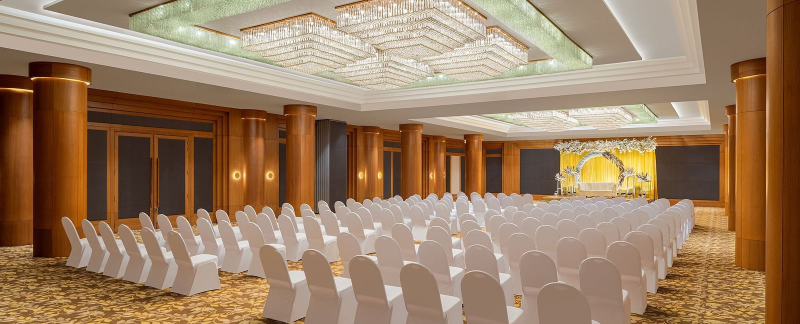 Seating arrangement in Orchid Hall at Essentia Luxury Hotel, Indore