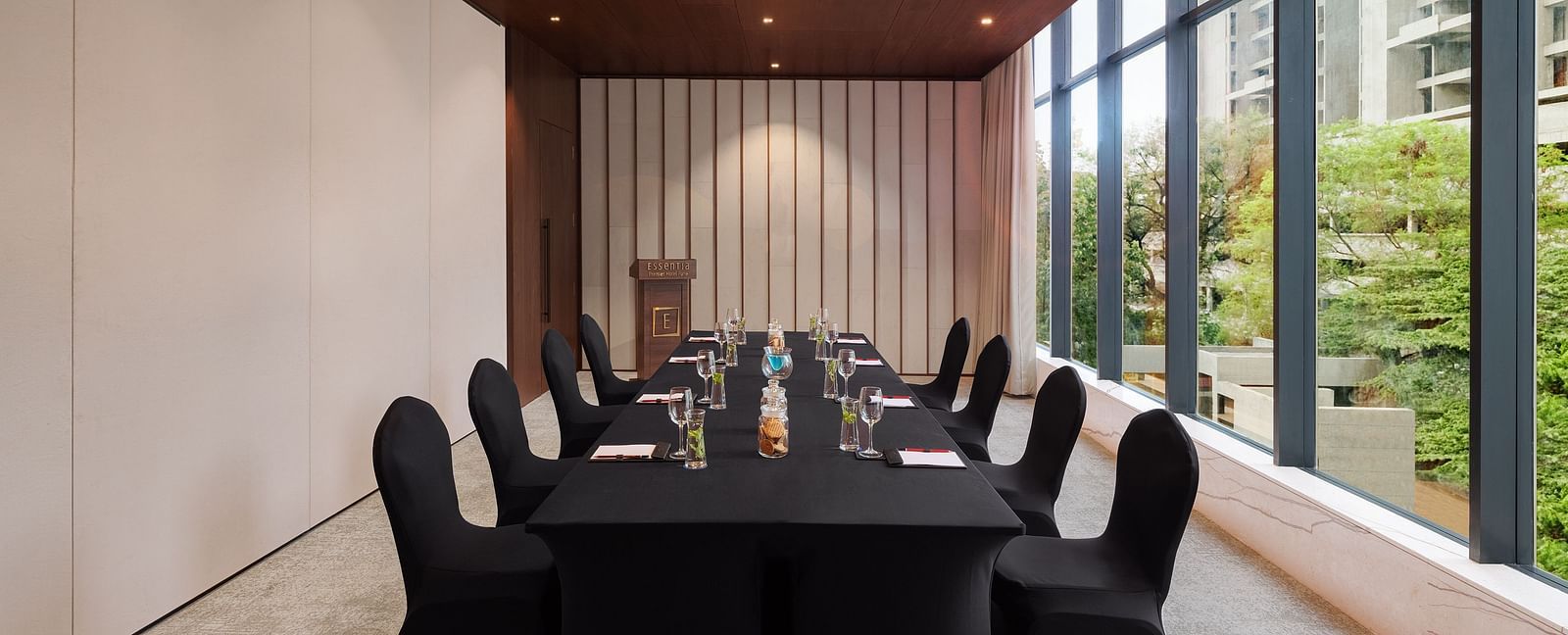 Carnival 1 with comfortable chairs facing towards the table at Essentia Premiere, Pune
