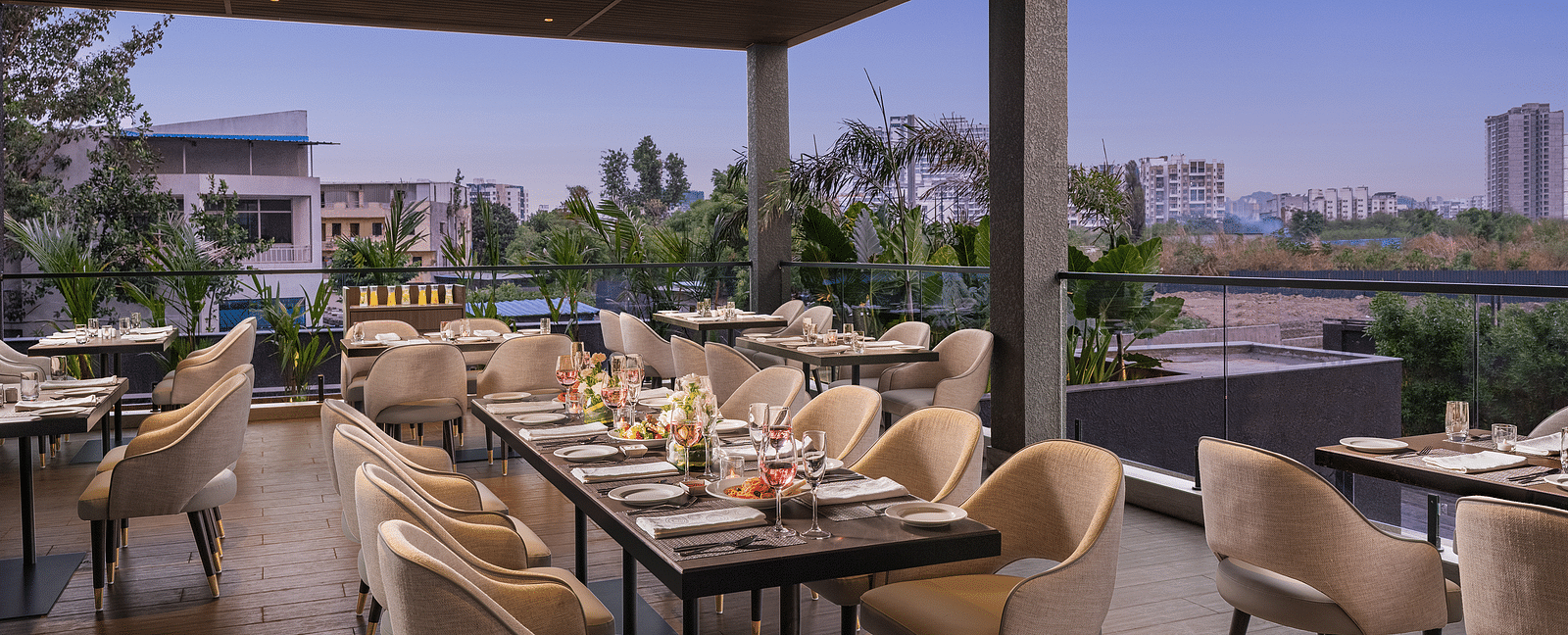 A view of dining area at Citron Bar with comfortable seating at Essentia Premiere, Pune.