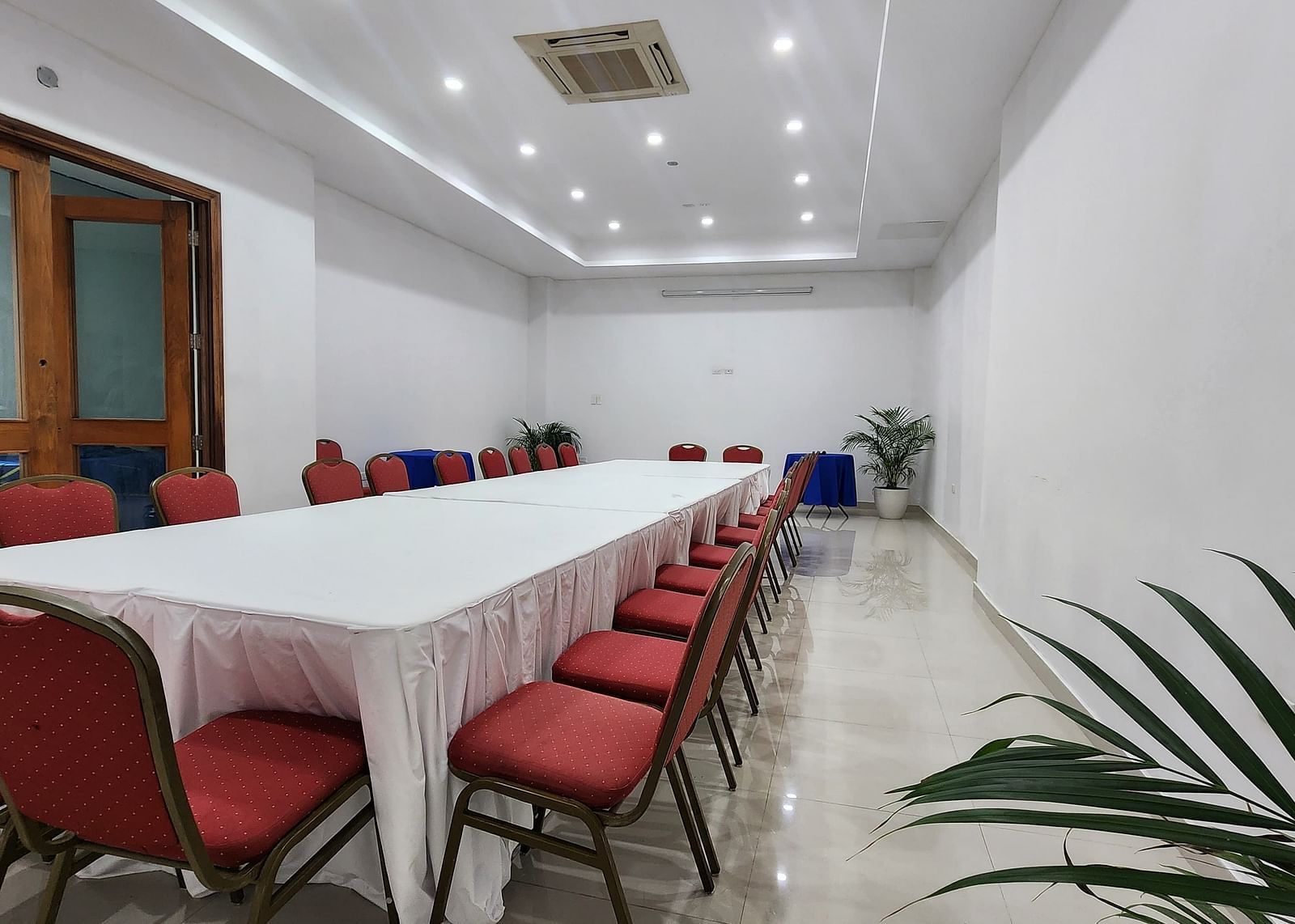 An image of a banquet hall with a table arranged in a long table arrangement - Hotel 39, Jamaica