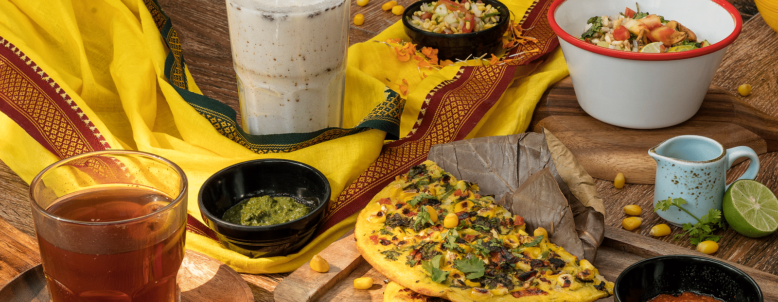 A picture featuring a variety of food items, including pizza, salad, and more.
