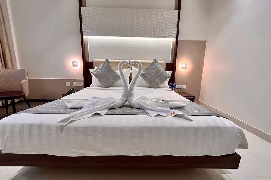 A front view of the bed in our Executive Room With Breakfast at Kyriad Prestige, Ilkal