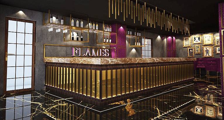 A Luxurious bar interior with a black and gold theme  - TGI Grand Fortuna, Hosur