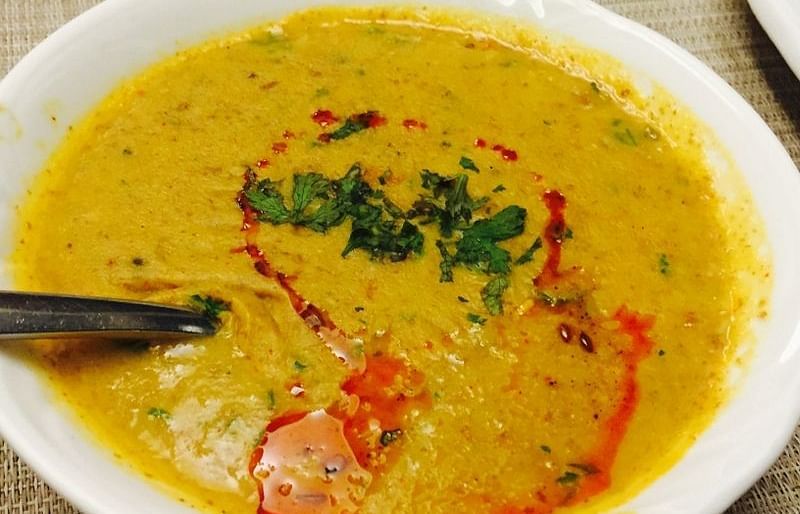 A picture featuring a Bowl of curry 