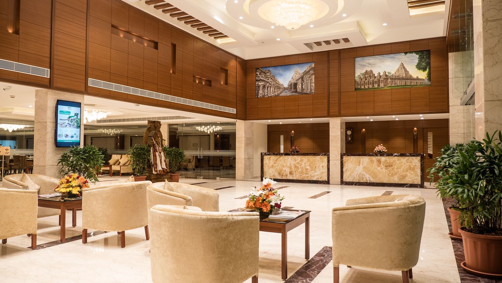 reception area with comfortable seating and warm lights of MM Legacy, Kanchipuram