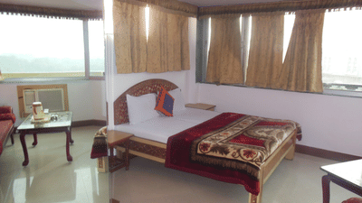 Hotel Taj Plaza Agra Taj Facing Superior Rooms with large windows and furniture