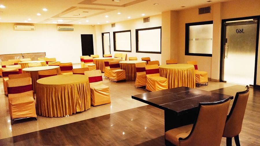 Banquet front view with table and cluster style seating - Five Elements The Claire, Gurugram