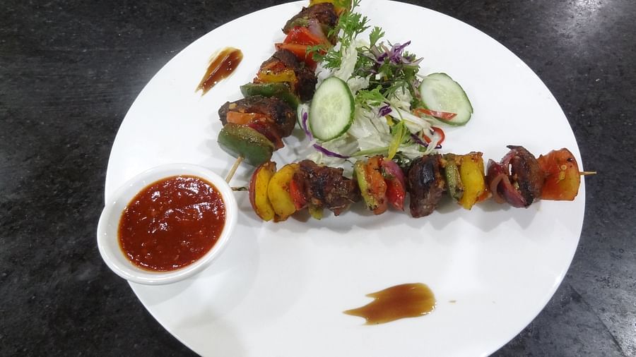 Colorful skewer dish served