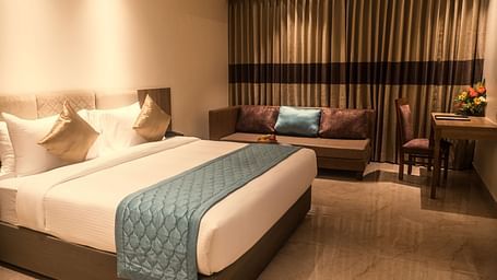 view of a king size bed of a Premium Room 