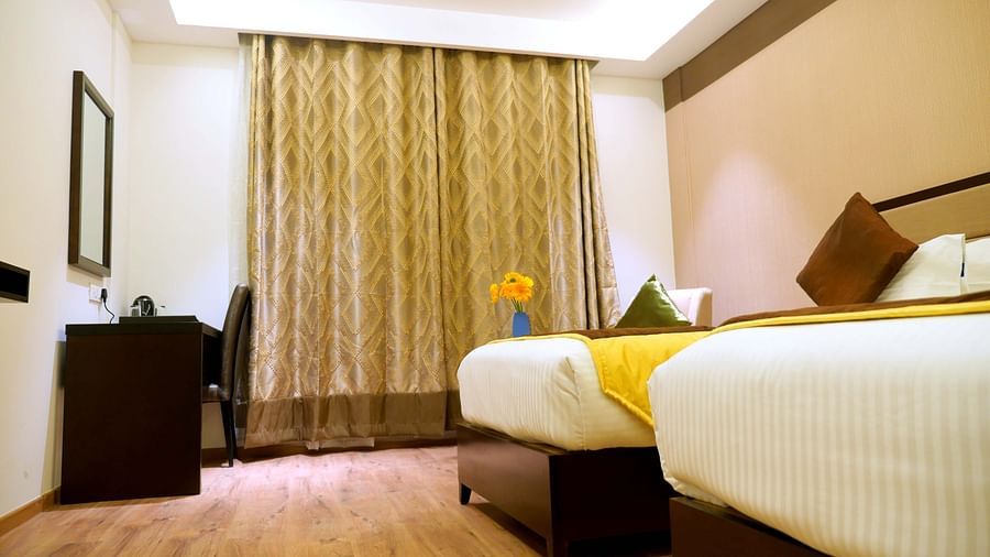 view of twin beds of Premium Twin Room of ASR Parklane, Hosur