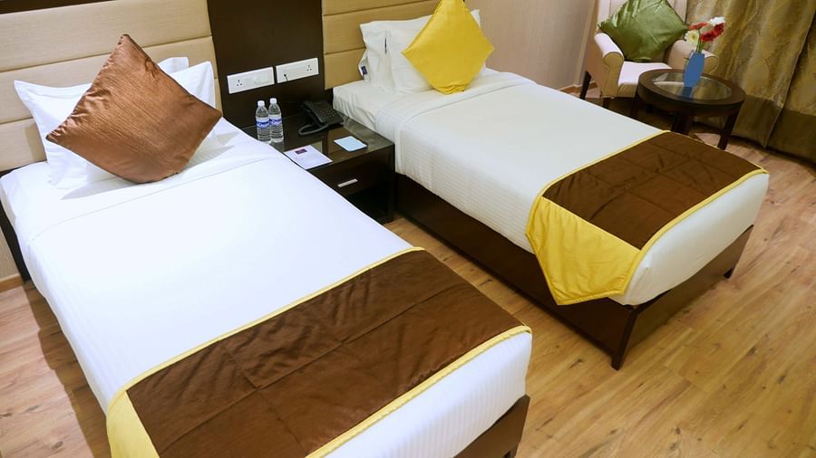 view of twin beds of Premium Twin Room of ASR Parklane, Hosur