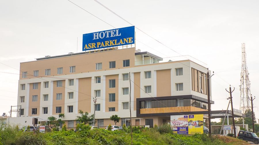 Facade of the ASR Parklane property featuring a large sign with 'ASR Parklane' prominently displayed.