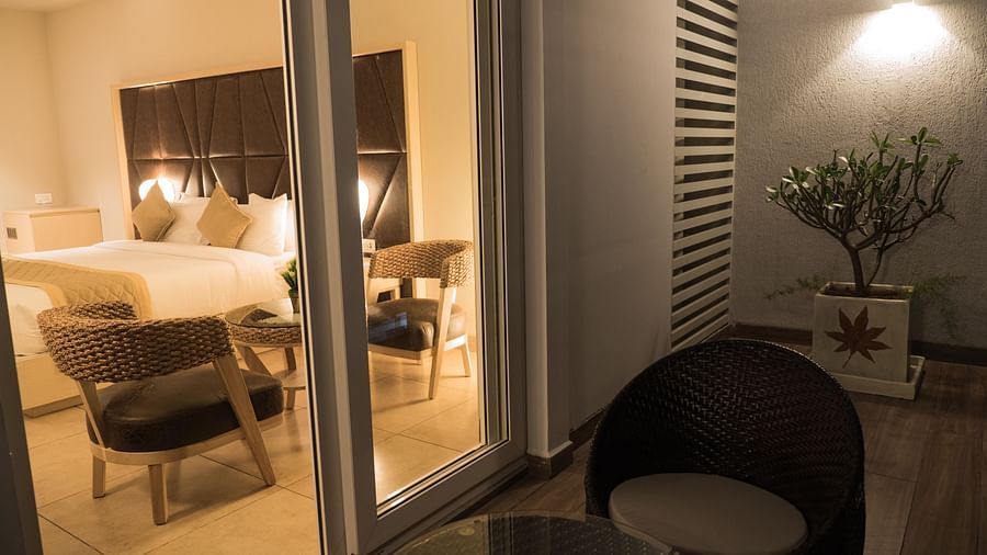 balcony of Premium Room with comfortable seating at Cholaa Dynasty, Kumbakonam