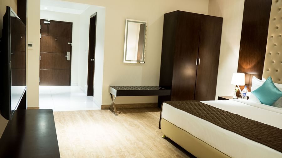 A large bed in Suite at Grand Ashok, Thanjavur.