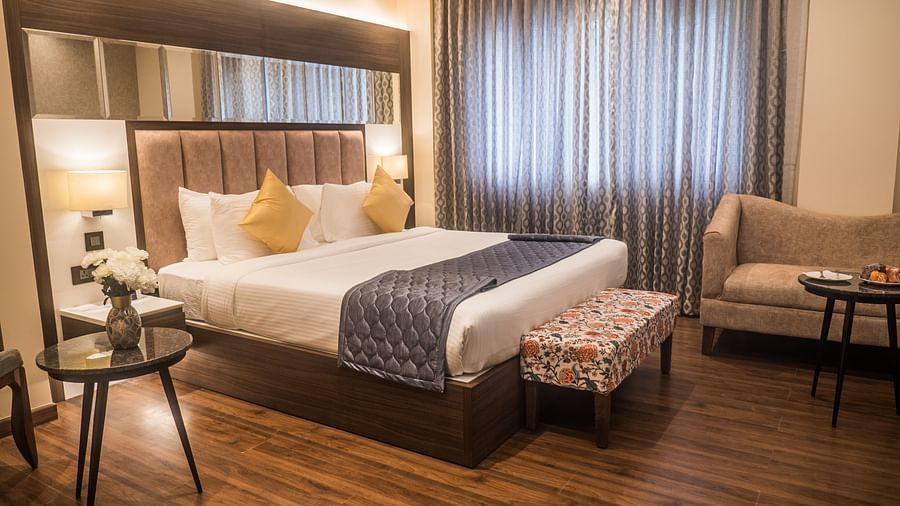 view of a king size bed of a Luxury Room 