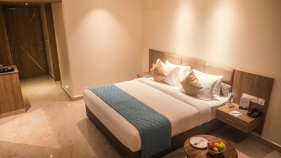 view of a king size bed of a Premium Room 