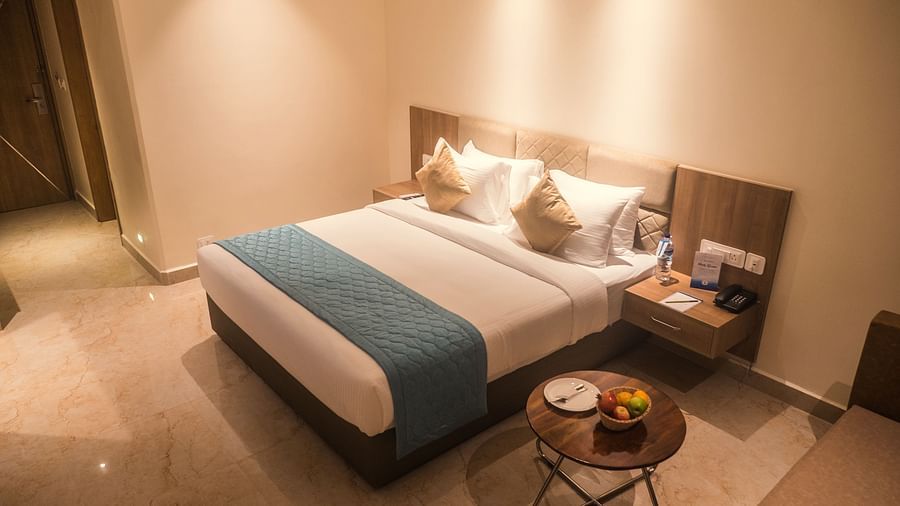 view of a king size bed of a Premium Room 