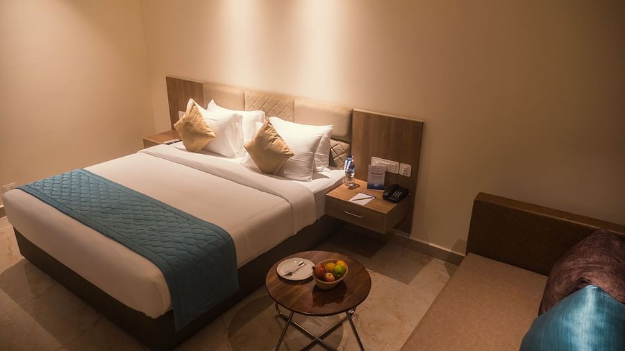 view of a king size bed of a Premium Room 
