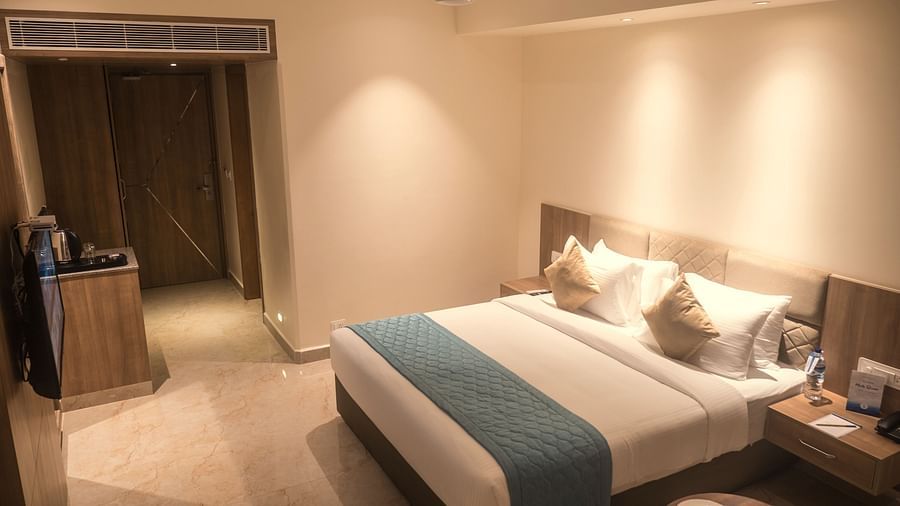 view of a king size bed of a Premium Room 