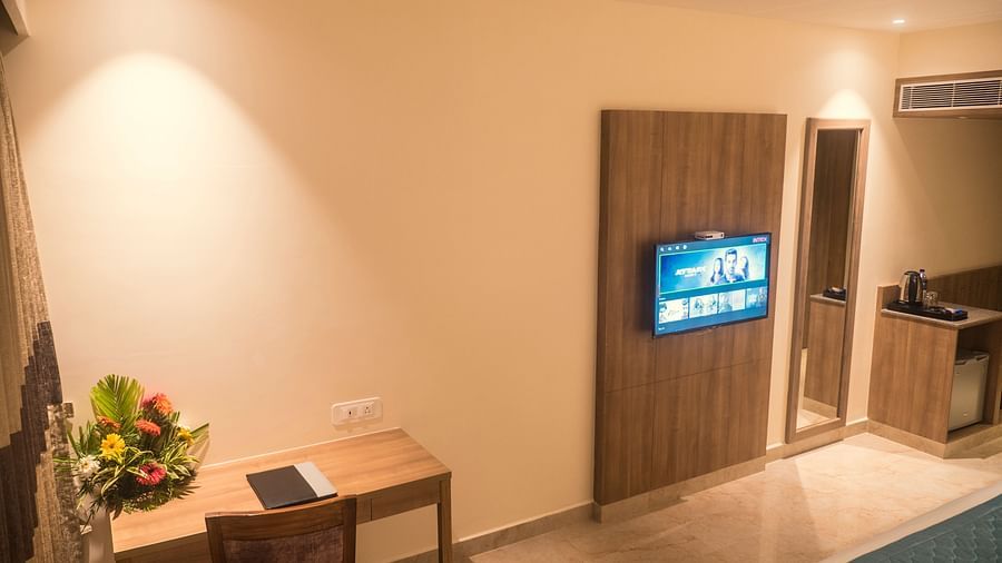 view of TV and a work desk of Premium Room