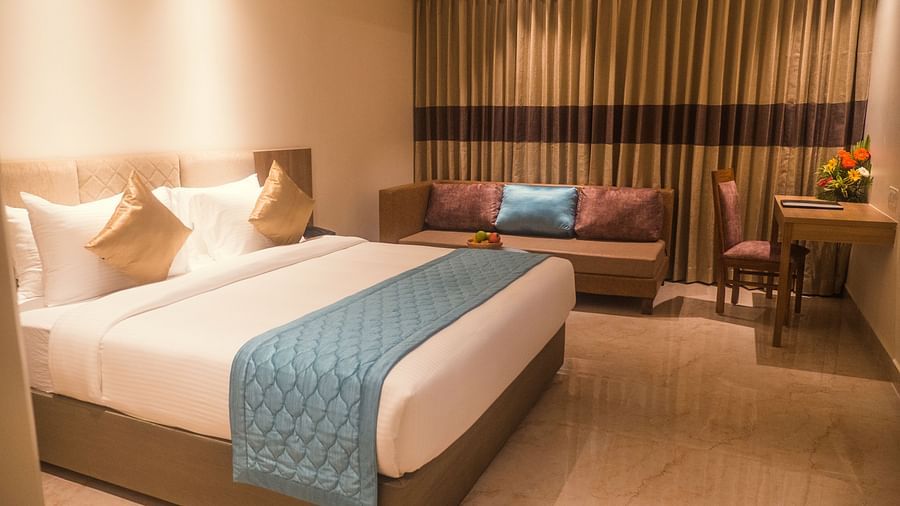 view of a king size bed of a Premium Room 