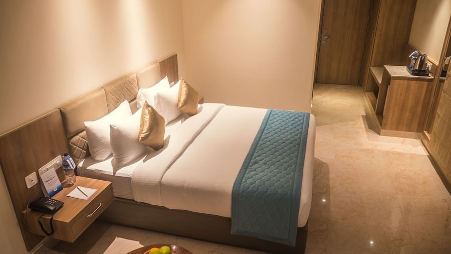 view of a king size bed of Luxury Sea View Room