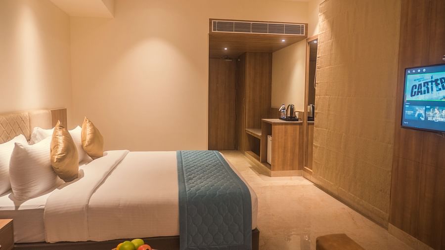 view of a king size bed of Luxury Sea View Room