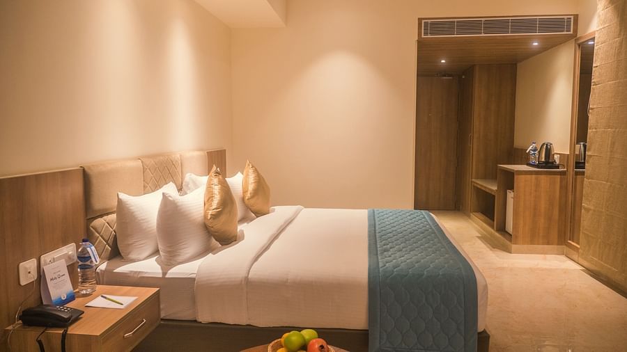 view of a king size bed of Luxury Sea View Room