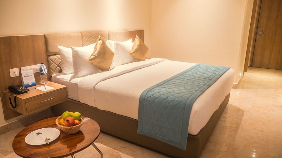 view of a king size bed of Luxury Sea View Room